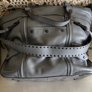 Aimee K Grey Fair Game Convertible Tote Leather w studded shoulder strap.